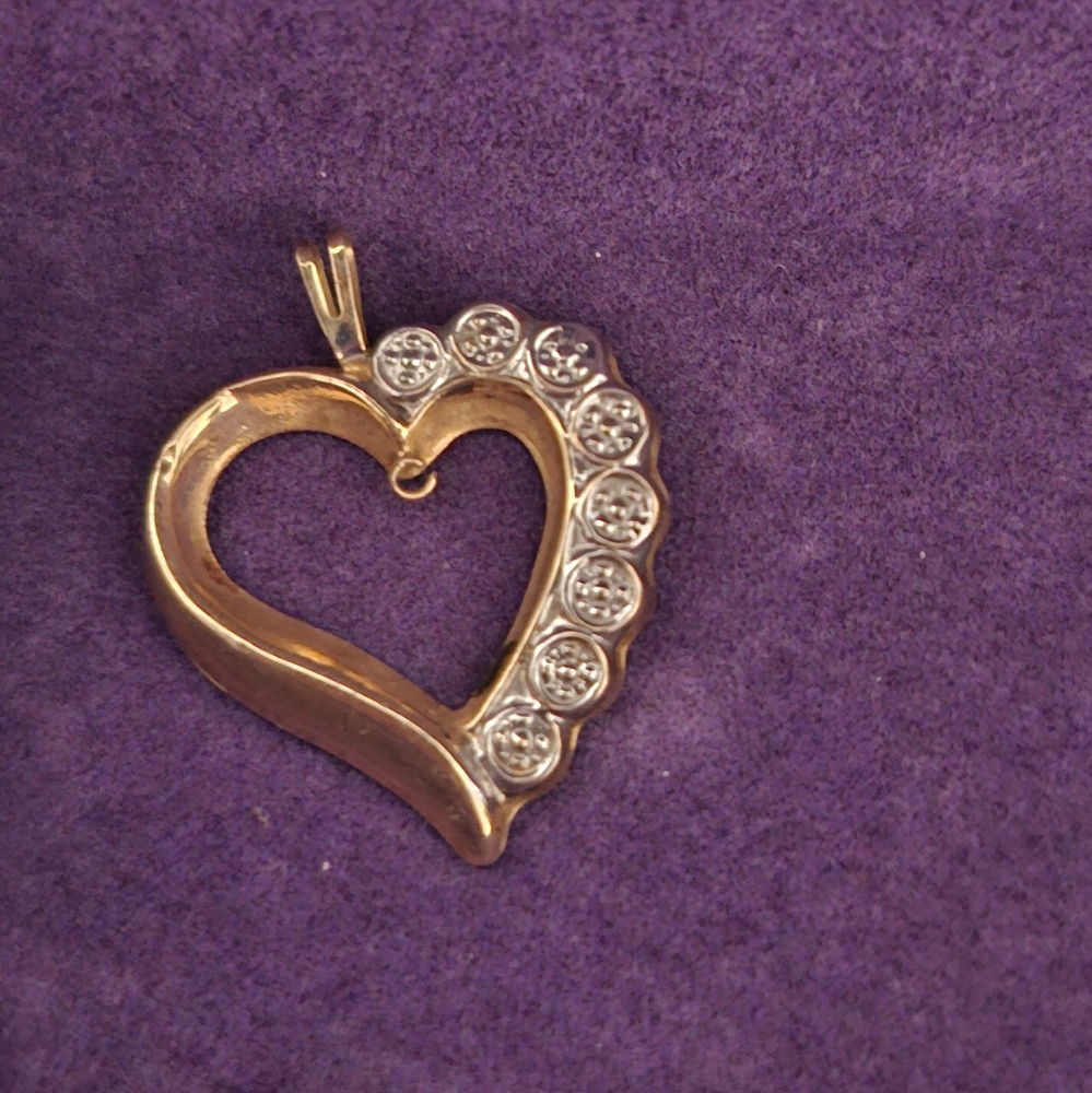 Elegant Gold and Silver Tone Heart Pendant